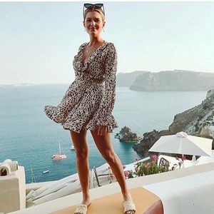 Kivari the Label stone leopard mini wrap dress.